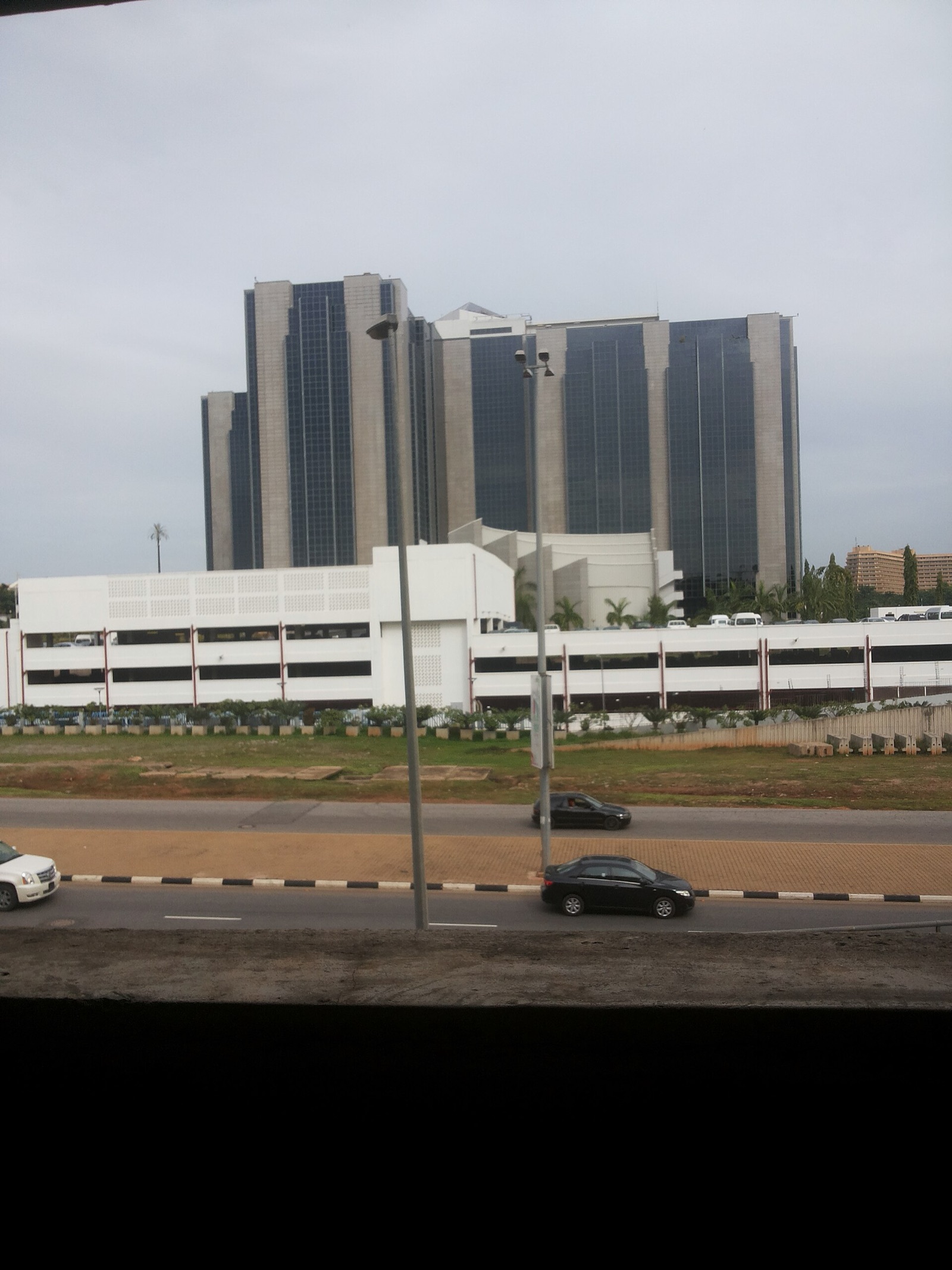 The Central Bank of Nigeria headquarters tower in Abuja, seen from a nearby building